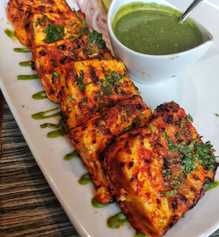 Grilled Paneer Tikka with colorful bell peppers and onions